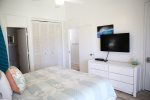 Master bedroom with flat screen TV with cable access and AC